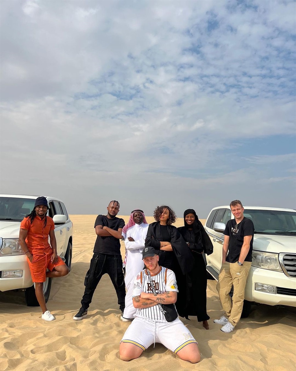 Simphiwe Tshabalala with his travelling crew in Qatar.