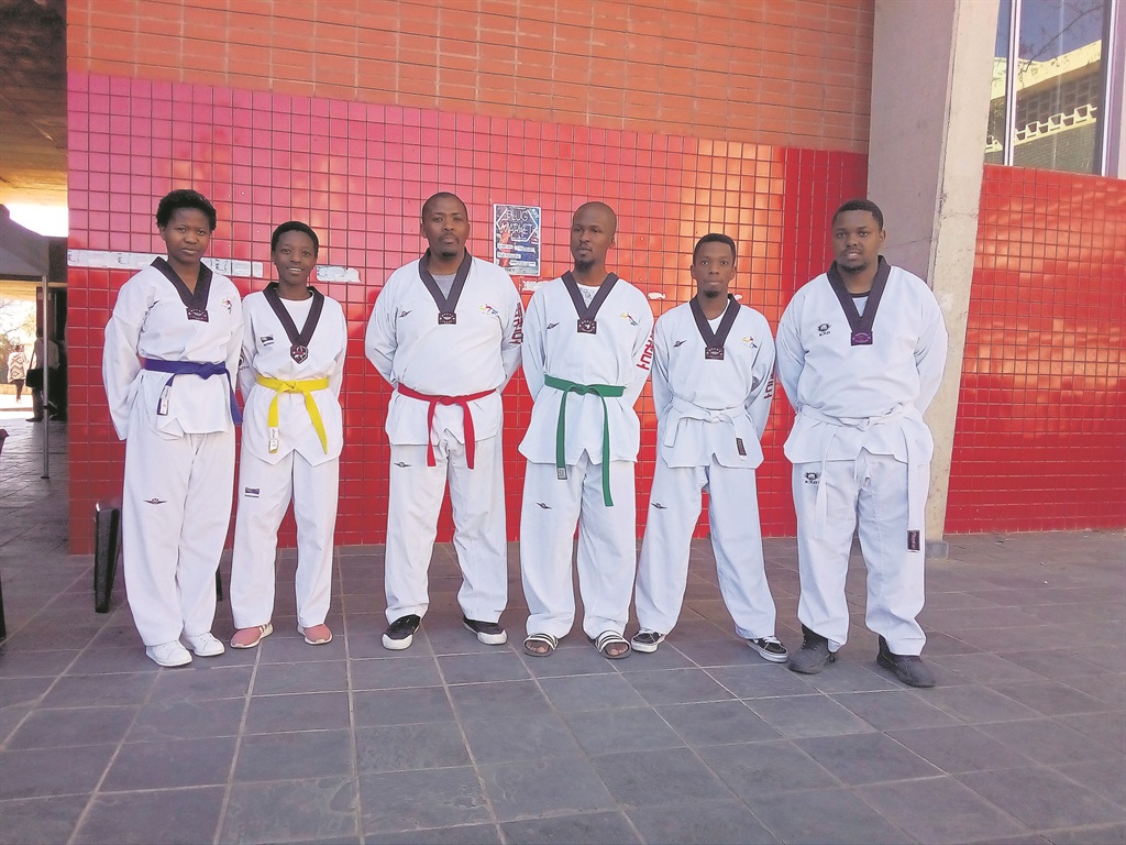 This taekwondo team teaches students to defend themselves. Photo by Nobathembu Zibi