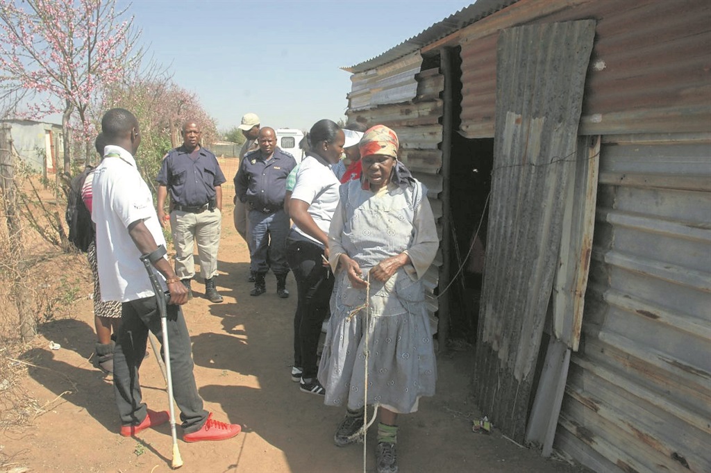 Blind gogo Selina Mdaku uses this rope to walk to the toilet. Photo By Phineas Khoza.