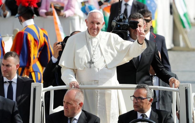 FILE PHOTO: Pope Francis leaves after a Mass for the canonisation of 19th-century British cardinal John Henry Newman, a Swiss laywoman, an Indian nun, an Italian nun and a nun known as the 'Mother Teresa of Brazil', at the Vatican, 13 October 2019. 