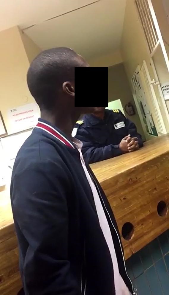 The video where a man believed to be the student is seen talking to cops. Video supplied 
