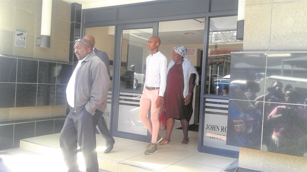 Some of the officials who were arrested leave the Durban Commercial Crimes Court.    Photo by Mbali Dlungwana