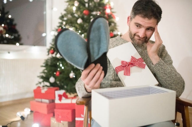 Instead of overspending this Christmas season, it would be wise to save money in the current economic climate, the author says. (PHOTO: Gallo Images / Getty Images)