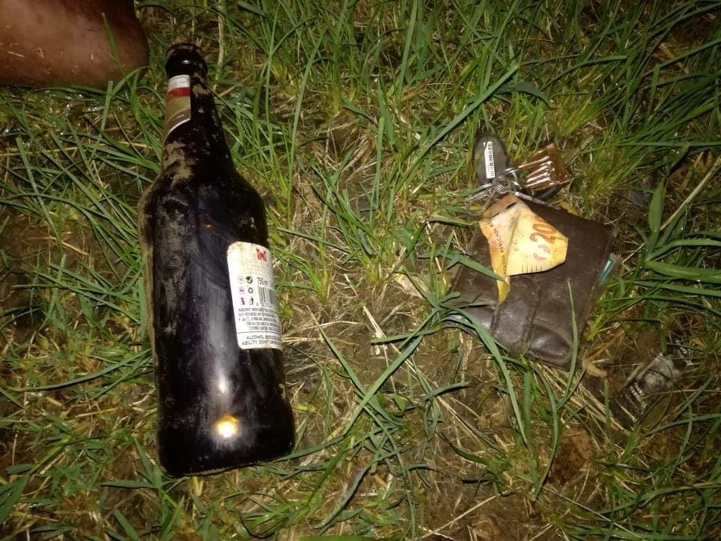 An empty beer bottle that was found inside the truck after the accident.  