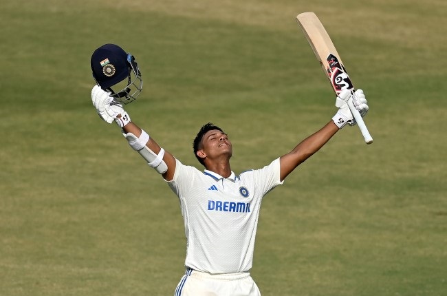 India's Yashasvi Jaiswal celebrates his century against England on the third day of the third Test at Saurashtra Cricket Association Stadium in Rajkot on Saturday. (Photo by Gareth Copley/Getty Images)