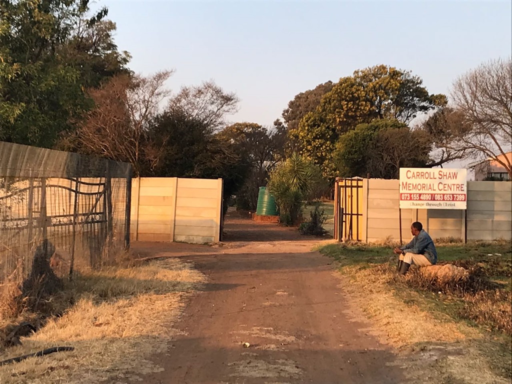 An employee sitting outside the Carroll Shaw non-profit organisation, one of five NPOs whose contracts were not renewed this year by the Gauteng government following allegations of mismanagement of funds. Picture: Msindisi Fengu