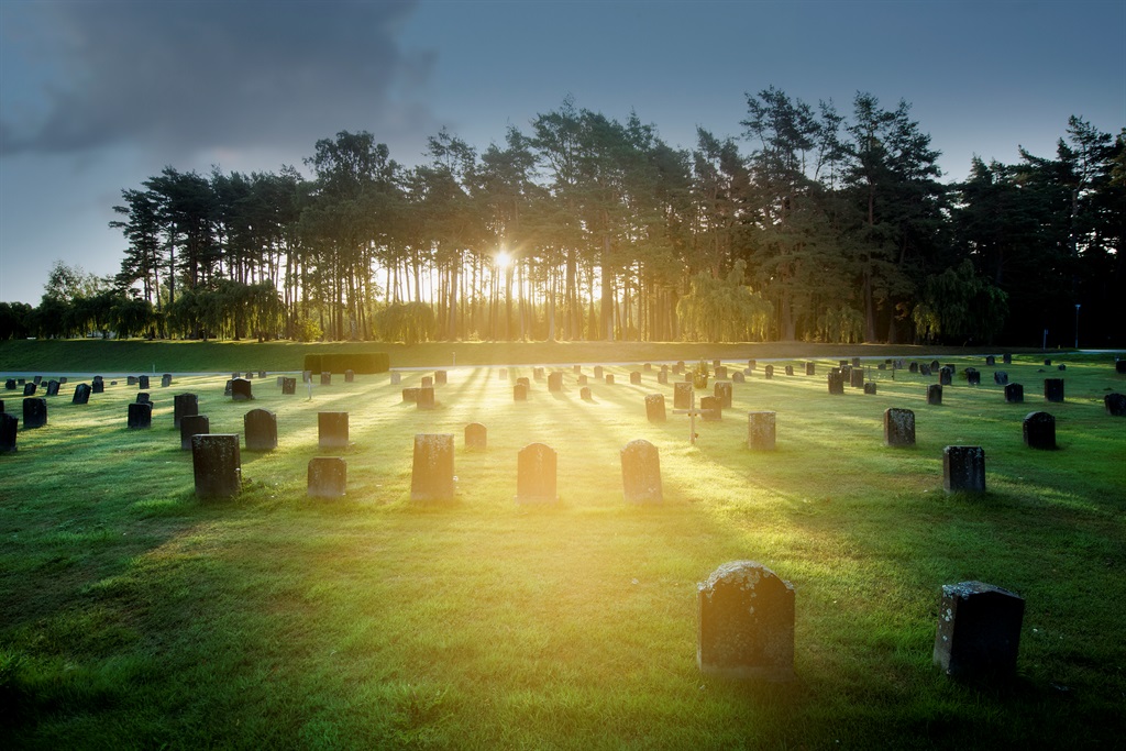 Sunrise over Unesco heritage Woodland cemerery in Sweden.