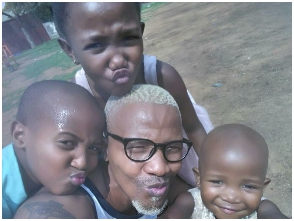 Thulo and his three children. (Photo: Supplied)
