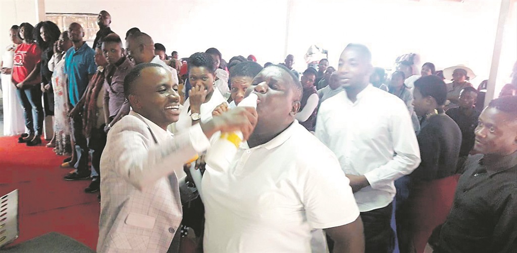 Prophet Rufus Phala of Ark Centre Ministry in Limpopo offers the deadly drink to church congregants. 