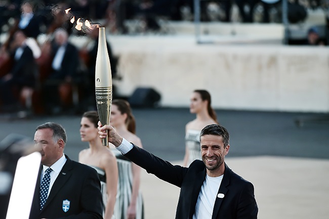 Sport | Olympic torch sets sail for France