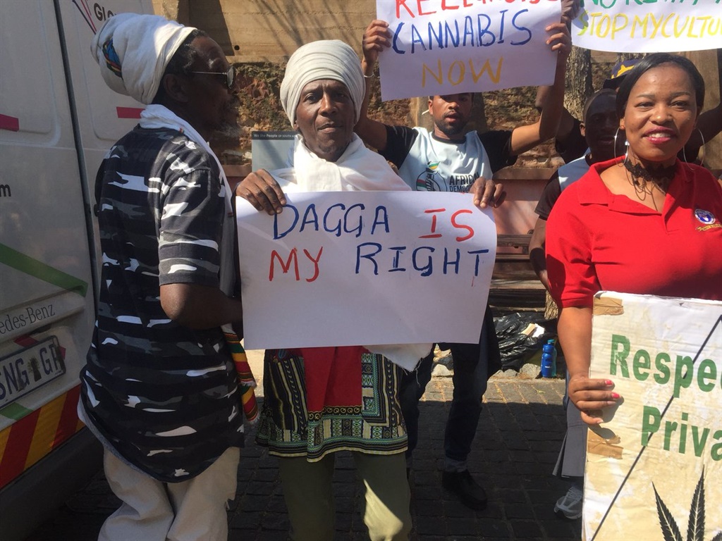 “Dagga is my right”, a placard reads outside the Constitutional Court on Tuesday. (Iavan Pijoos, News24)