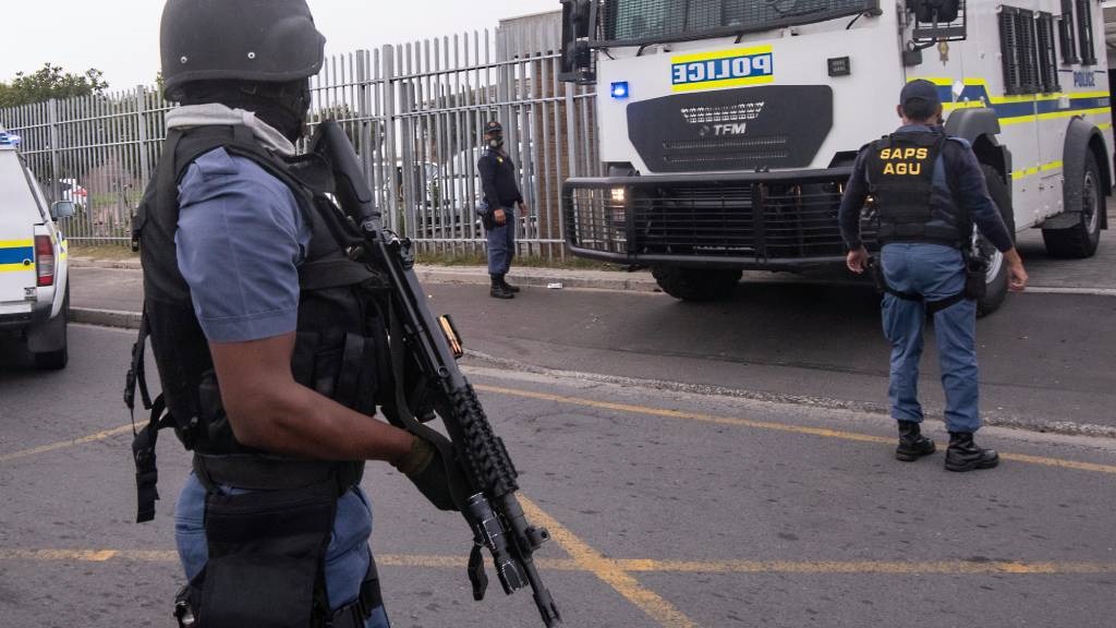 Members of the police's Anti-Gang Unit are seen in Bishop Lavis, Cape Town. (Brenton Geach/Gallo Images)