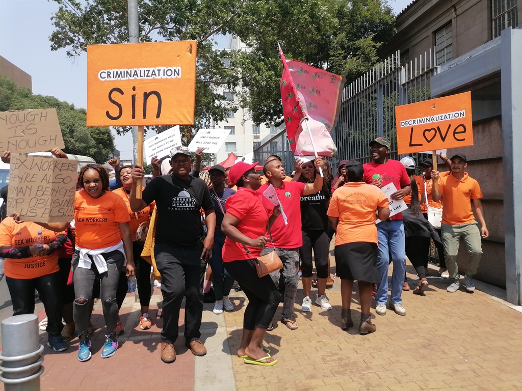 Outside the Johannesburg Magistrate Court, sex-workers and several civil rights organisations, chanting struggle songs while carrying placards written decriminalise love. Photos by Kgomotso Medupe.