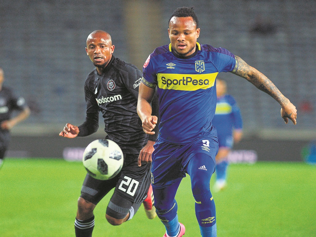 Pirates’ Xola Mlambo (left) and Edmilson Dove of Cape Town City battle for the ball during their league game last night.Photo byTrevor Kunene