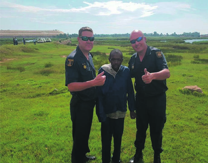 Buyile Jani was saved by two cops, Warrant Officer Wynand du Toit and Constable Freddy Matfield.
