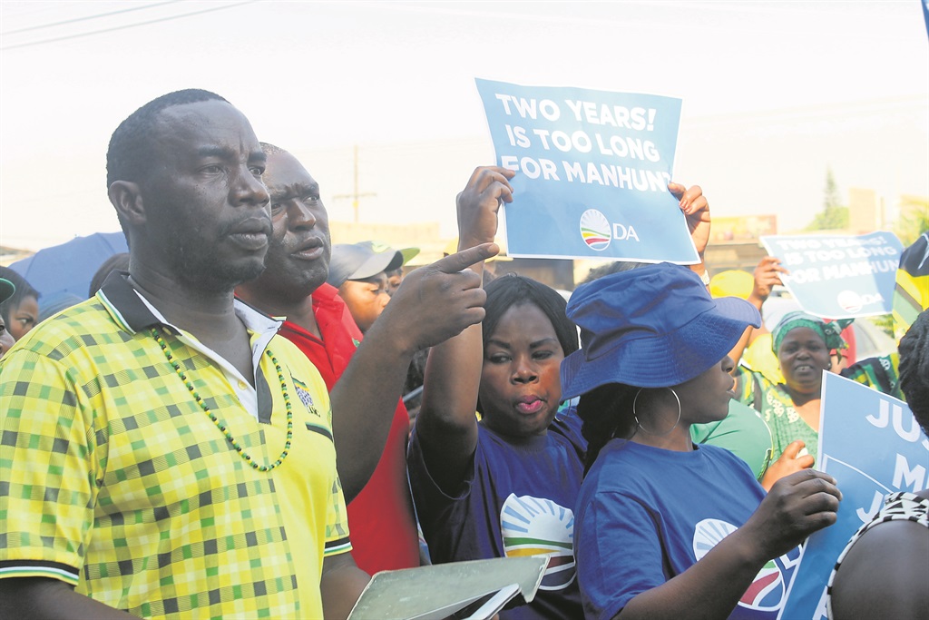 Members of rival political parties set aside their differences to petition against the release of a suspected hijacker. The group marched to Nkomazi Magistrates Court on Tuesday.                              Photo by Thokozile Mnguni 