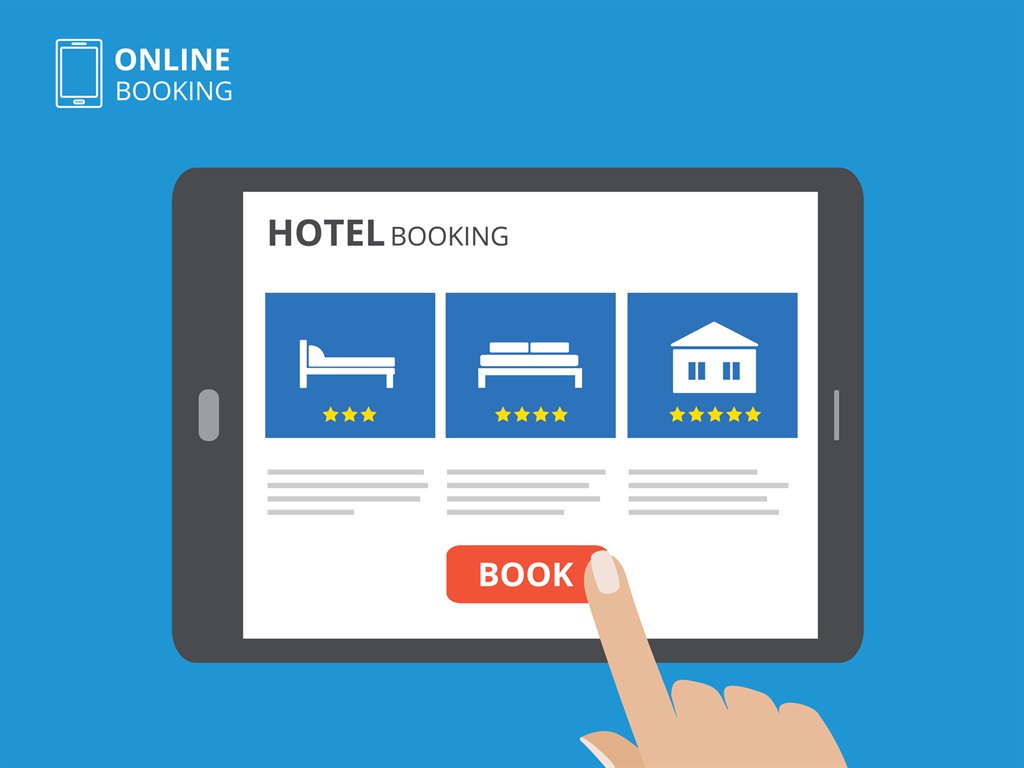 Design concept of hotel booking online. Tablet computer with hand touching a screen. Display with book button and bed icons. Mobile application for renting accommodations.