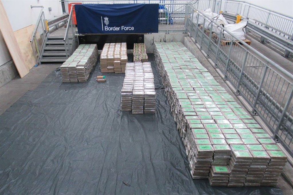 A handout picture released by the National Crime Agency (NCA) on 22 February 2024 shows packages of cocaine seized at the harbour of Southampton, southern England, announced the Organised Crime Agency (NCA). On 8 February 2024, British police made a record seizure of 5.7 tonnes of cocaine in a container in the port of Southampton. The cocaine, with a street value of more than £450 million according to UK market prices, was concealed in a cargo of bananas from South America. NCA investigators believe that the final destination of the goods was the German port of Hamburg.