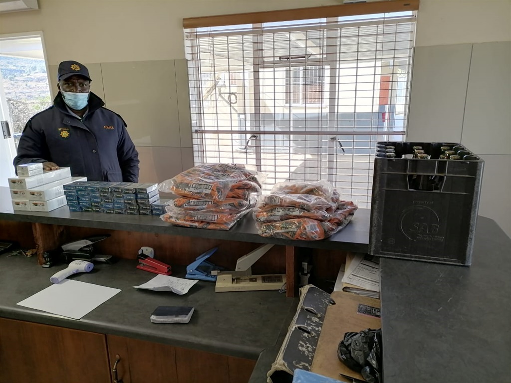 Police members patrolling the Telle Bridge border between South Africa and Lesotho found several boxes of cigarettes and alcohol seemingly left behind by a smuggler.