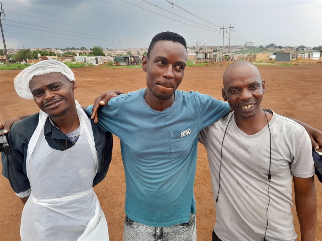 Members of Life 4 u Foundation, Tebogo Tsoku, Obakeng Malatsi, and Philemon Chambal fight poverty in Tembisa, Ekurhuleni.  Photo by Happy Mnguni
