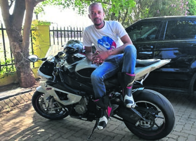 Mashea ‘Mash’ Qekisi on his BMW bike he calls Rocket.  Photo by    Thabo Monama