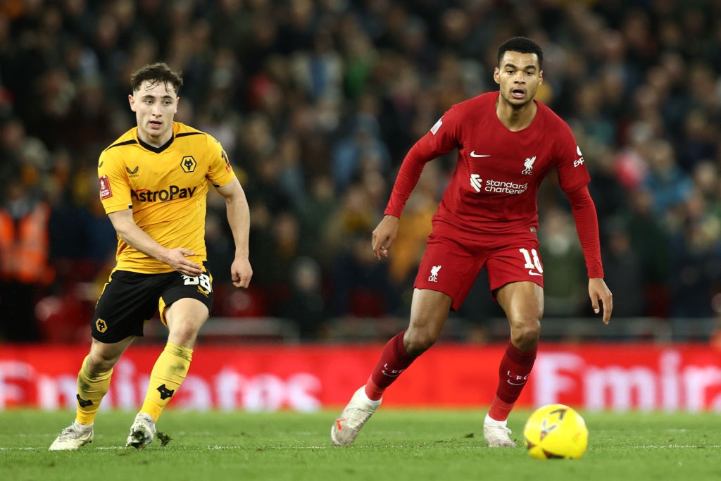 LIVERPOOL, ENGLAND - JANUARY 07: Cody Gakpo of Liverpool and Joe Hodge of Wolverhampton Wanderers look on during the Emirates FA Cup Third Round match between Liverpool FC and Wolverhampton Wanderers at Anfield on January 07, 2023 in Liverpool, England. (Photo by Naomi Baker/Getty Images)