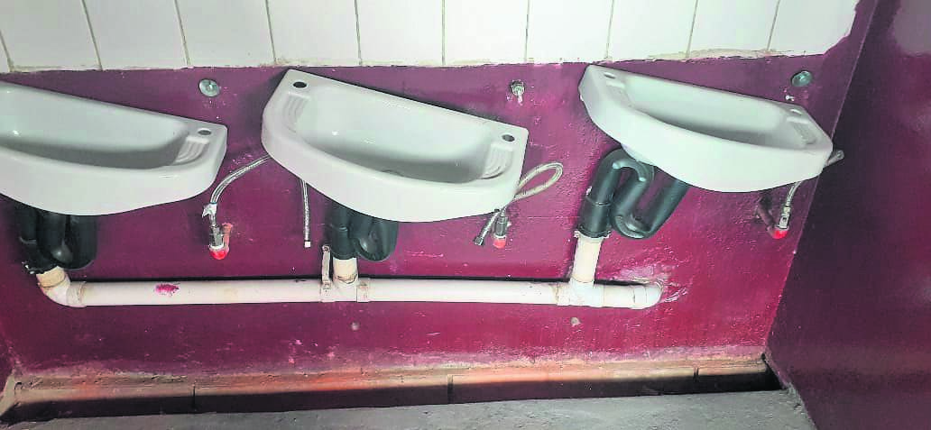 Damaged basins in toilet facilities. 