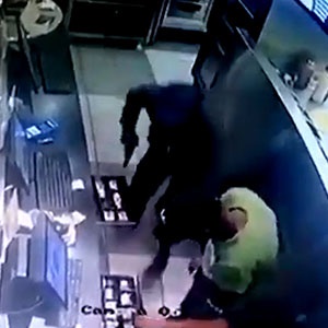 thieves empty the tills of a pizza shop