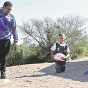 Legless 9-year-old Grayton Rhode defies odds on the Rugby field 