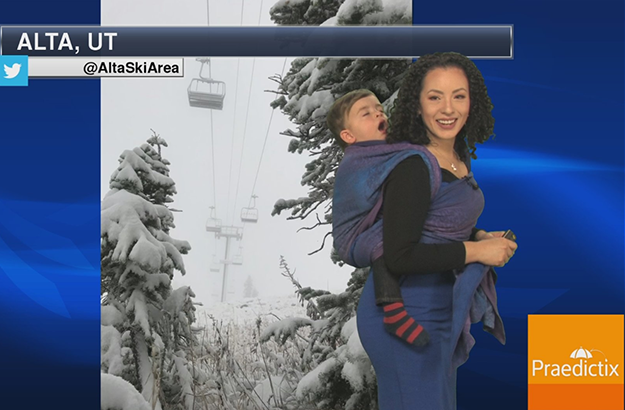 Susie Martin delivers the weather forecast with her one-year-old son strapped to her back.