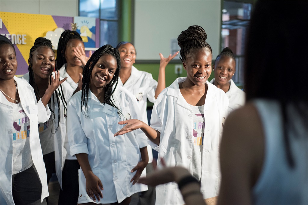 The I Am Science project wants to normalise the image of a black girl in a laboratory wearing a white coat. Picture: Supplied