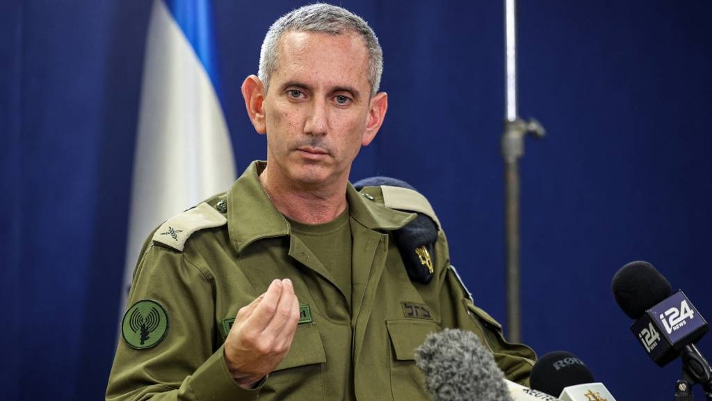 Israeli army spokesperson Rear Admiral Daniel Hagari speaks to the press from The Kirya, which houses the Israeli Ministry of Defence, in Tel Aviv. (Gil Cohen-Magen/AFP)