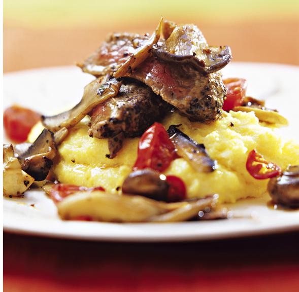 Sauteed mushrooms with beef fillet and polenta. Recipe available. Photo by 