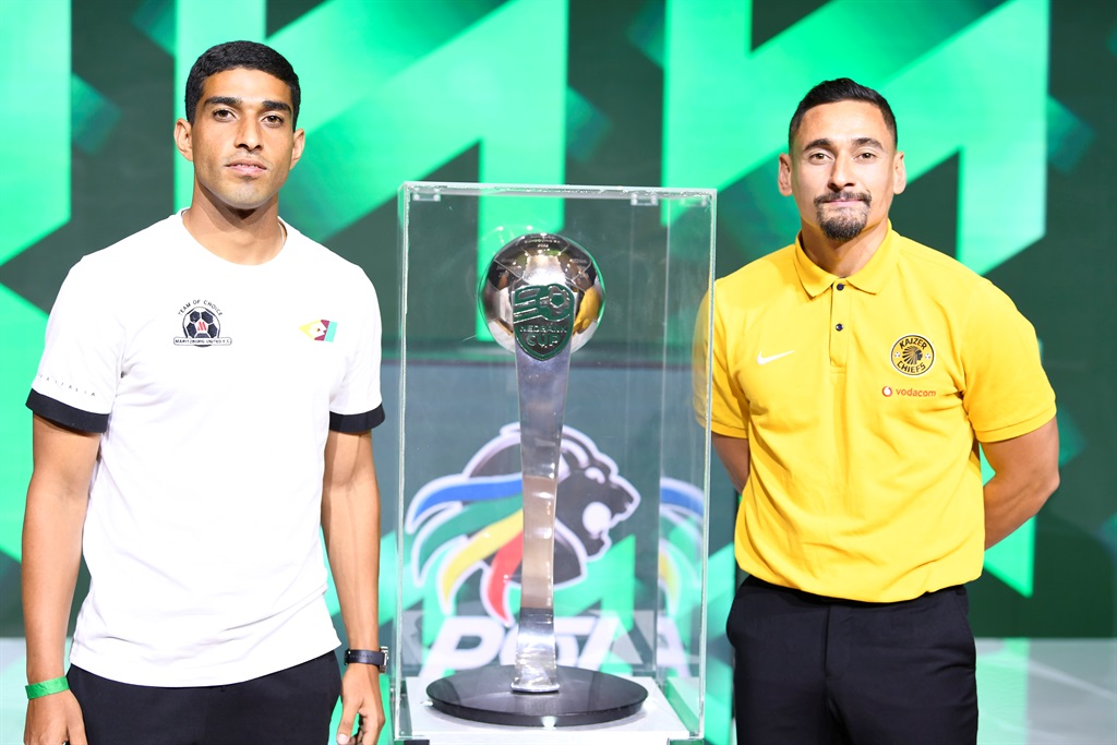 Kaizer Chiefs midfielder Cole Alexander poses with the Nedbank Cup trophy alongside Travis Graham of Maritzburg United after their teams were drawn against each other in the last 32. Photo: Lefty Shivambu/Gallo Images
