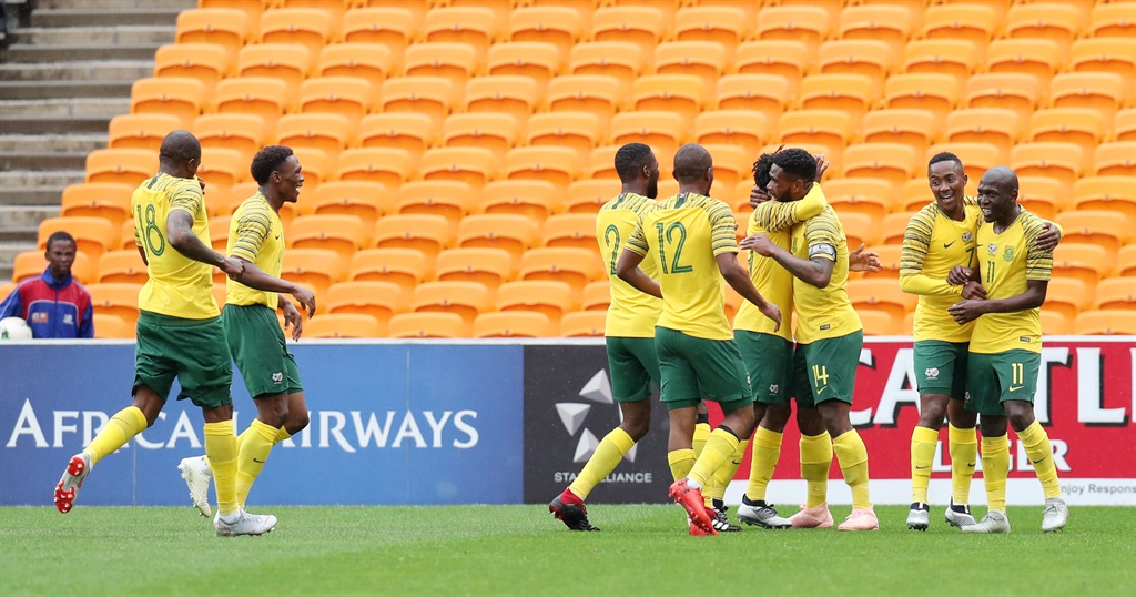 Thulani Hlatshwayo of South Africa celebrates goal with teammates 