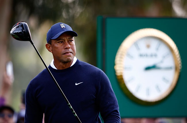 American golfer Tiger Woods admires his drive (Ronald Martinez/Getty Images)