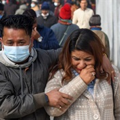 'God has taken away such a nice person': Grieving Nepali families begin receiving bodies from crash