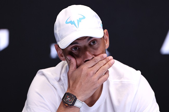 A dejected Rafael Nadal speaks to the media after losing to Mackenzie McDonald at the Australian Open. (Photo by Cameron Spencer/Getty Images)
