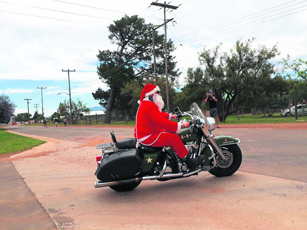 Father Christmas drove into the venue on a motorcycle.                                                  