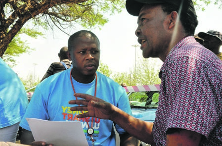 An investigator listens to a Soweto resident during Smart Money Week.         Photo By Thabo Monama