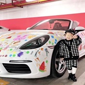 Mom sparks online parenting debate by letting her 2-year-old paint all over her Porsche