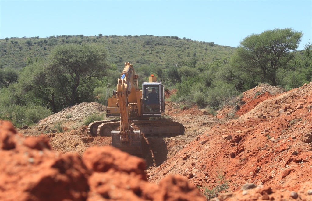 The McGregor museum successfully got a permanent interdict at the Kimberley High court on (April 19 2016) against Jackie M Wesi mining to prevent them from mining on the heritage archaeolog site of Canteen Kopie in Barkly West and Jabu Hayes. Lukas Sonneberg working on the escalator. Picture: Christiaan Cloete 