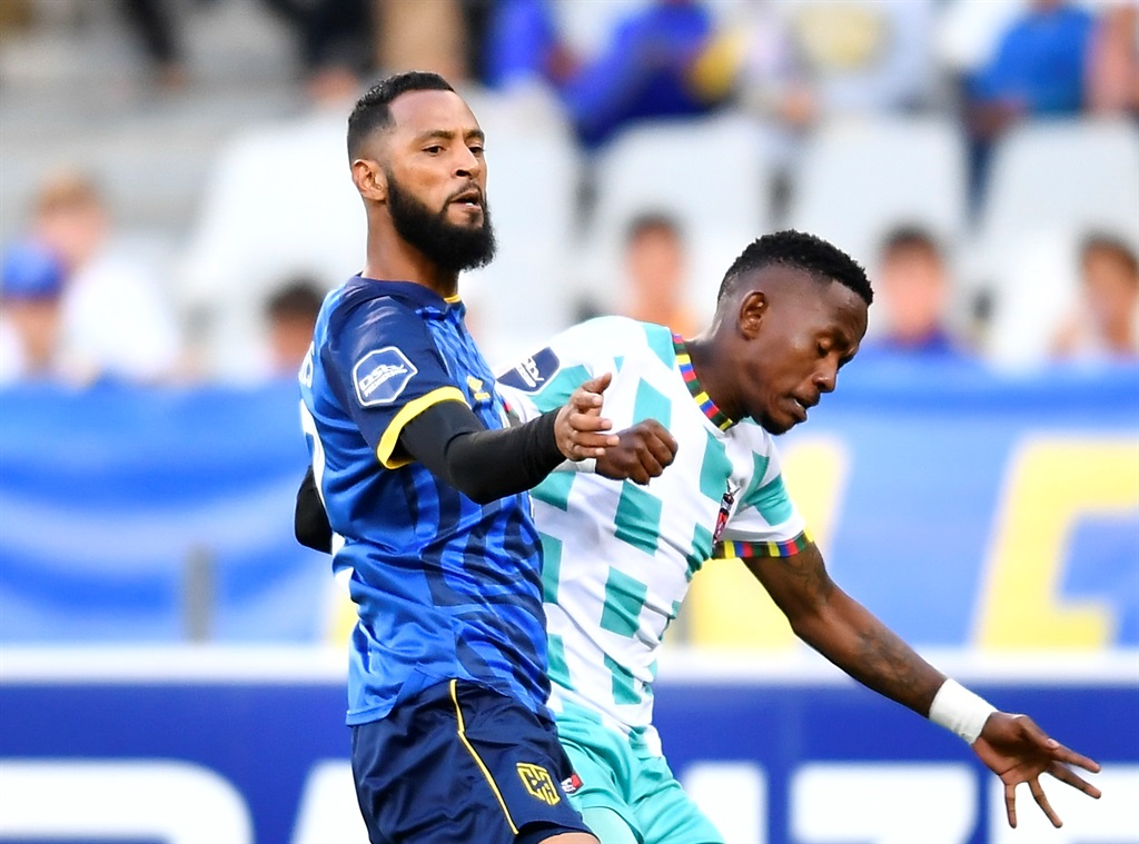 CAPE TOWN, SOUTH AFRICA - JANUARY 20: Taariq Fielies of CTCFC and Orebotse Mongae of TS Galaxy FC during the DStv Premiership match between Cape Town City FC and TS Galaxy at DHL Stadium on January 20, 2023 in Cape Town, South Africa. (Photo by Ashley Vlotman/Gallo Images)