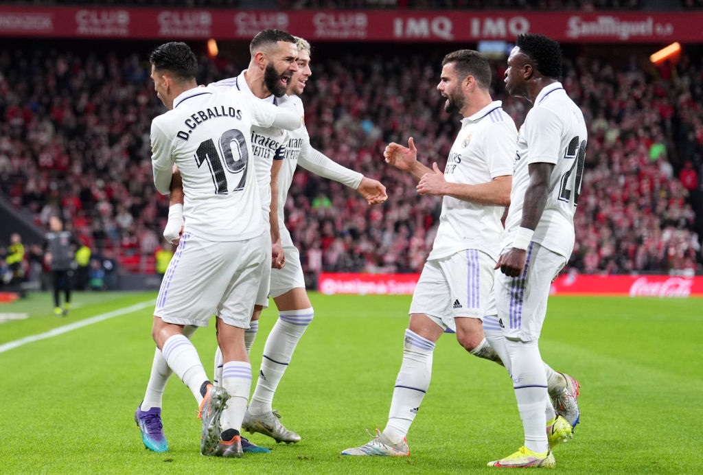 BILBAO, SPAIN - JANUARY 22: Karim Benzema celebrates with Dani Ceballos of Real Madrid after scoring the teams first goal during the LaLiga Santander match between Athletic Club and Real Madrid CF at San Mames Stadium on January 22, 2023 in Bilbao, Spain. (Photo by Juan Manuel Serrano Arce/Getty Images)