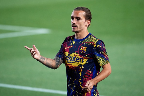 Antoine Griezmann of FC Barcelona gestures during the warm up before the Liga match between FC Barcelona and RCD Espanyol at Camp Nou on July 08, 2020 in Barcelona, Spain. Football Stadiums around Europe remain empty due to the Coronavirus Pandemic as Government social distancing laws prohibit fans inside venues resulting in all fixtures being played behind closed doors. (Photo by Alex Caparros/Getty Images)