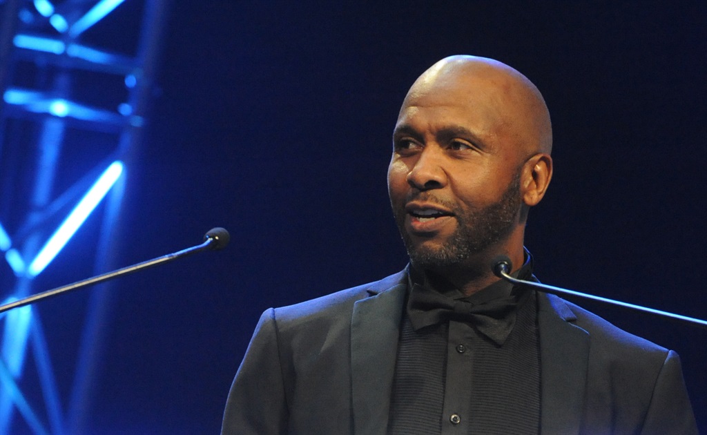 Lucas Radebe presents and award during the 2017 Discovery Sport Industry Awards at Sandton Convention Centre on May 18, 2017 in Johannesburg, South Africa. 