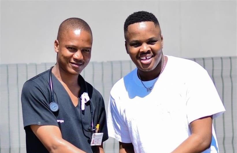 Dr Nqubeko Langa (left), who is an intern doctor with maskandi star Khuzani Mpungose. 