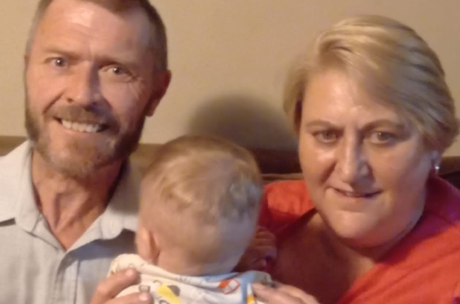 Foster parents Fritz and Anita Rademan with baby Theunsie. (PHOTO: Supplied) 