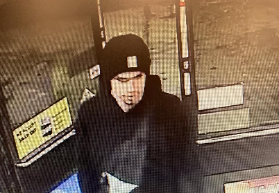 This surveillance camera image released by the Yakima Police Department in Washington State on January 24, 2023, reportedly shows the suspect sought by police in a shooting that left three people dead. Handout / Yakima Police Department / AFP