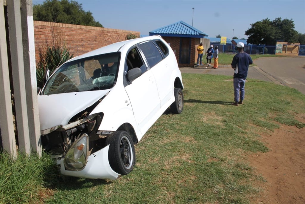 An alleged drunk driver crashed into this school wall. Photo by Phineas Khoza